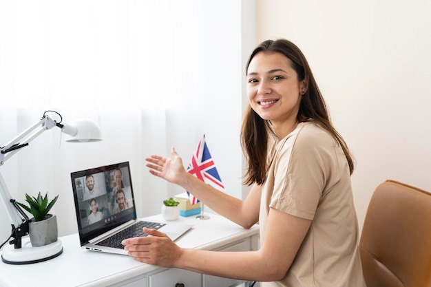 young woman teaching english lessons online home 23 2149019823
